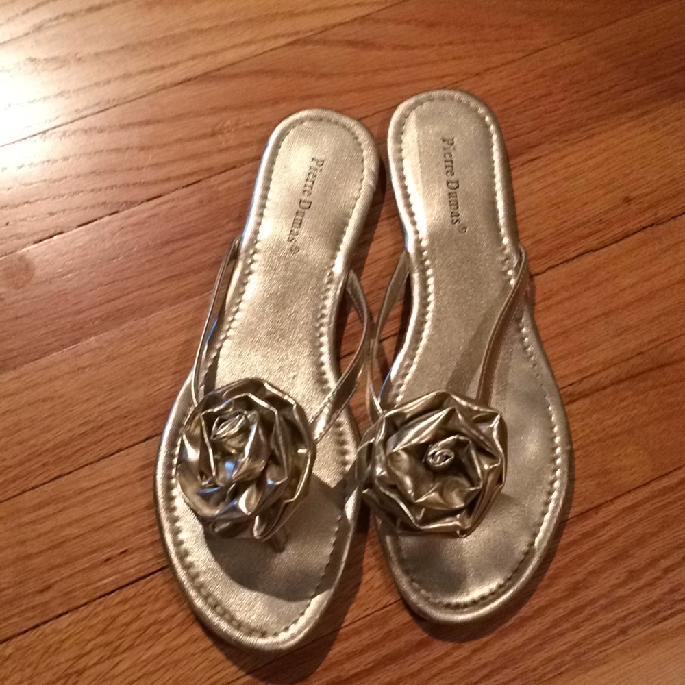 Metallic flower flip flops